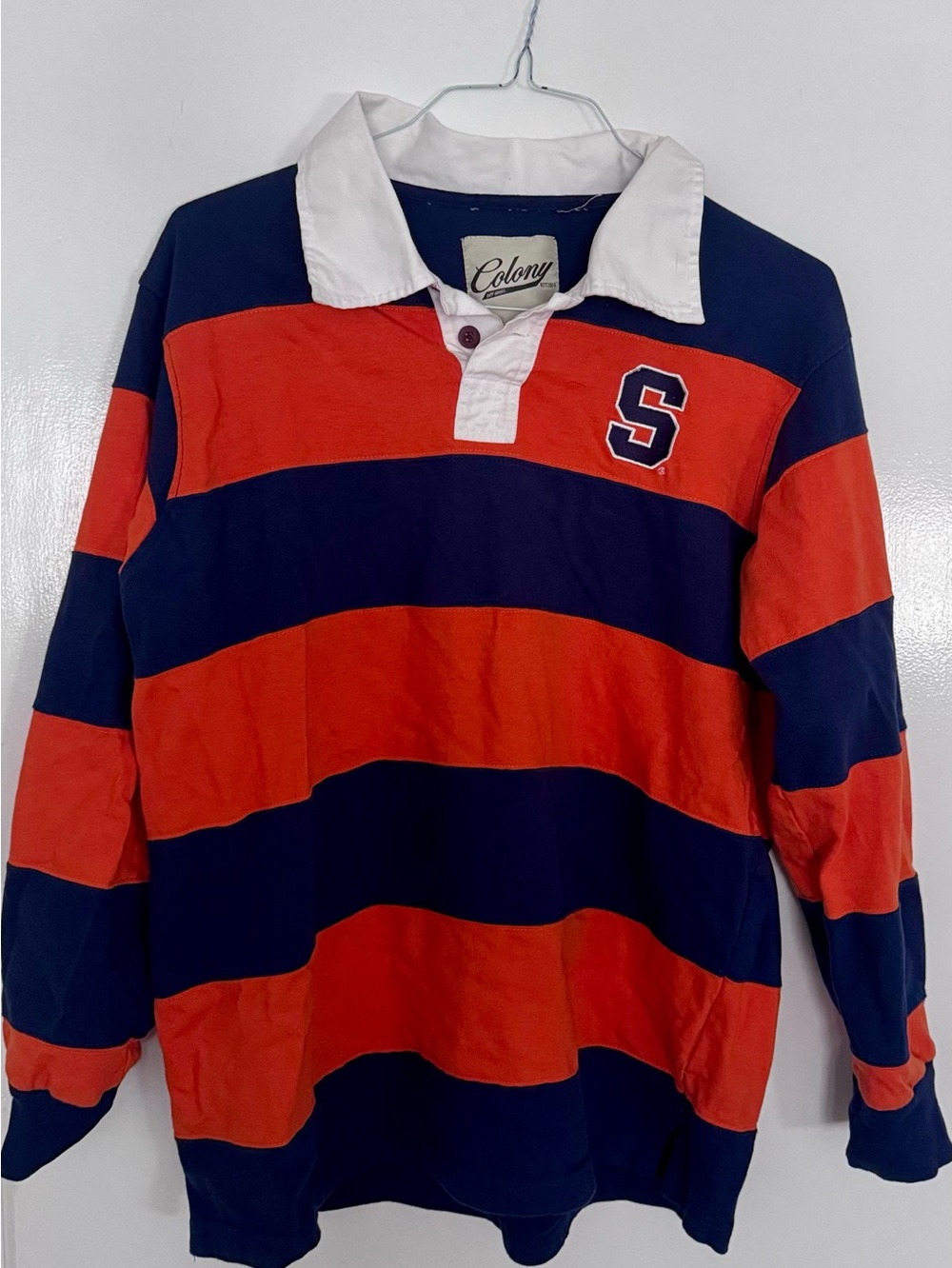 Syracuse Rugby Shirt Navy & Orange Rugby Shirt with 'S' Patch. 100% Cotton.